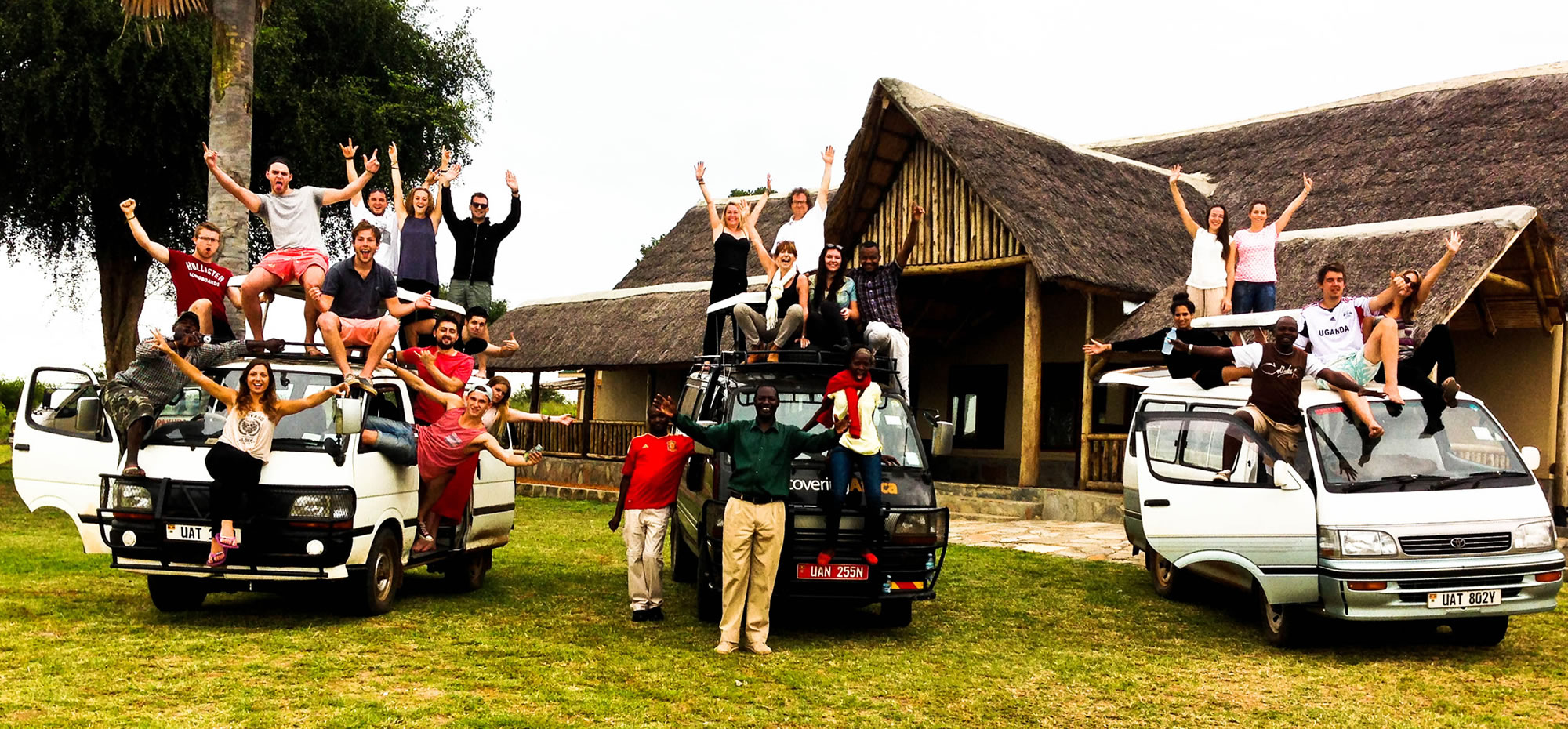 Three groups of young people each on a safari jeep